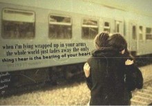 When i'm lying wrapped up in your arms the whole world just fades away.jpg